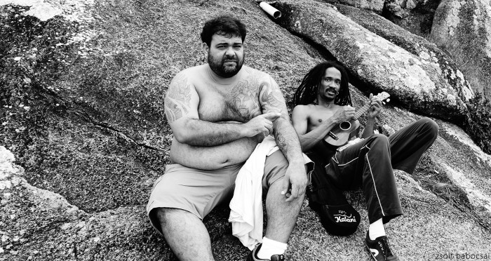 Florianopolis, Brazil fat man and Rastafari chilling out